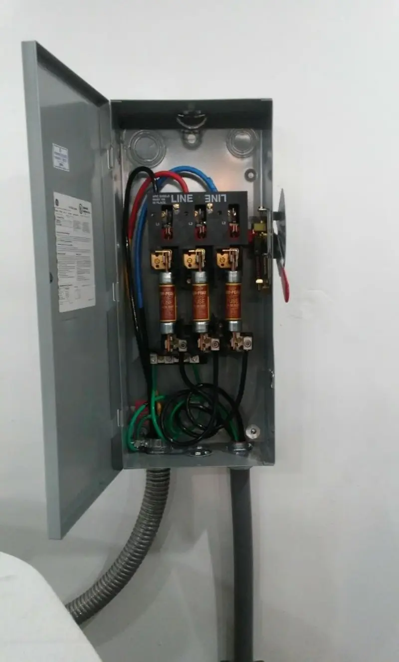 Three-phase disconnect switch installed for Smoke Detector Installation in Islandia